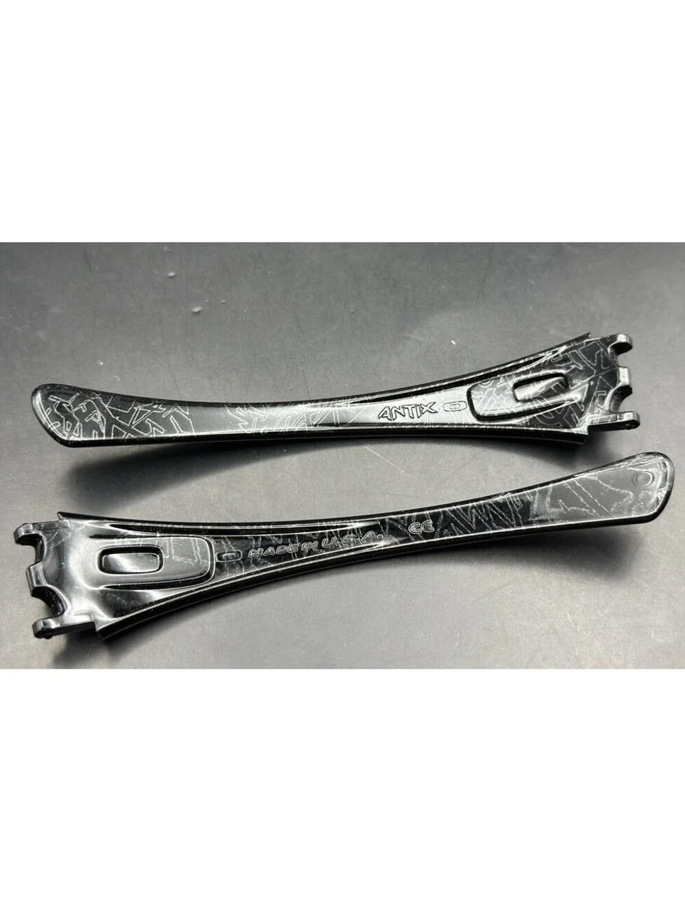 Oakley Antix Polished Black History Text OEM Replacement Arms